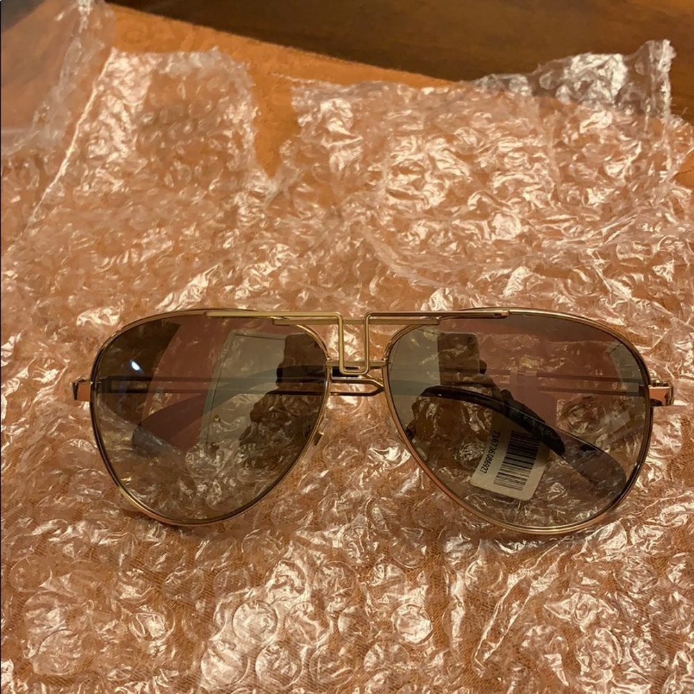 Givenchy Sunglasses. Unisex - Picture 7 of 8